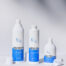 KrX Aesthetics Probiotic Set – Face Wash, Toner und Cream mit geöffneten Deckeln, dreiteiliges Hautpflege-Set